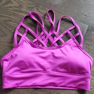 Magenta strappy front and back sports bra